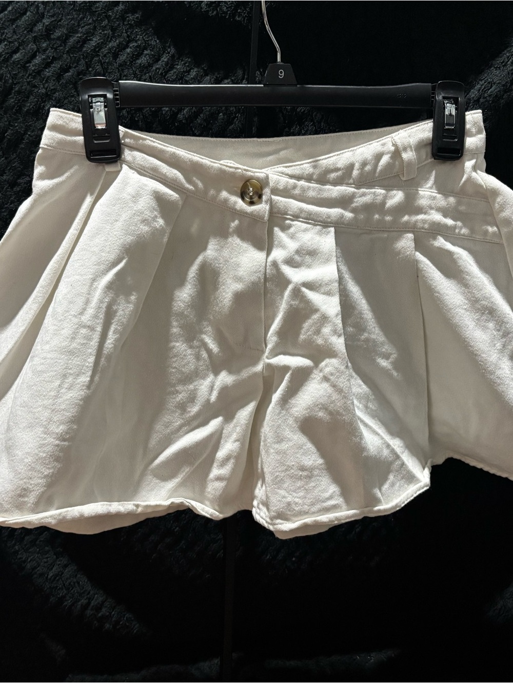 Le Lis Cream Asymmetrical Pleated Mini Skirt with Button Accent